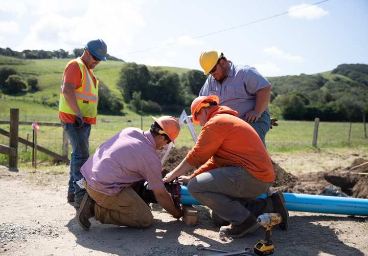 Employees of the North Marin Water District secure the new water main for Point Reyes Station and surrounding communities.