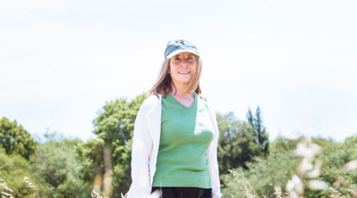 Linda Blackwood stands in a field