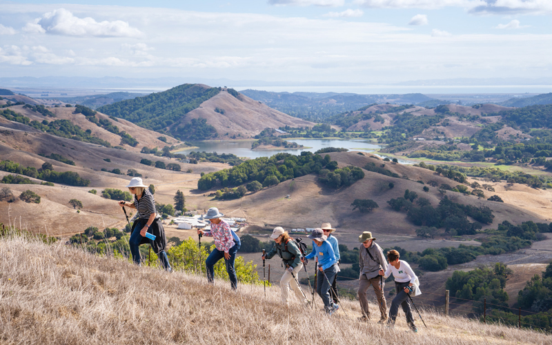 A group of hikers on MALT-protected land